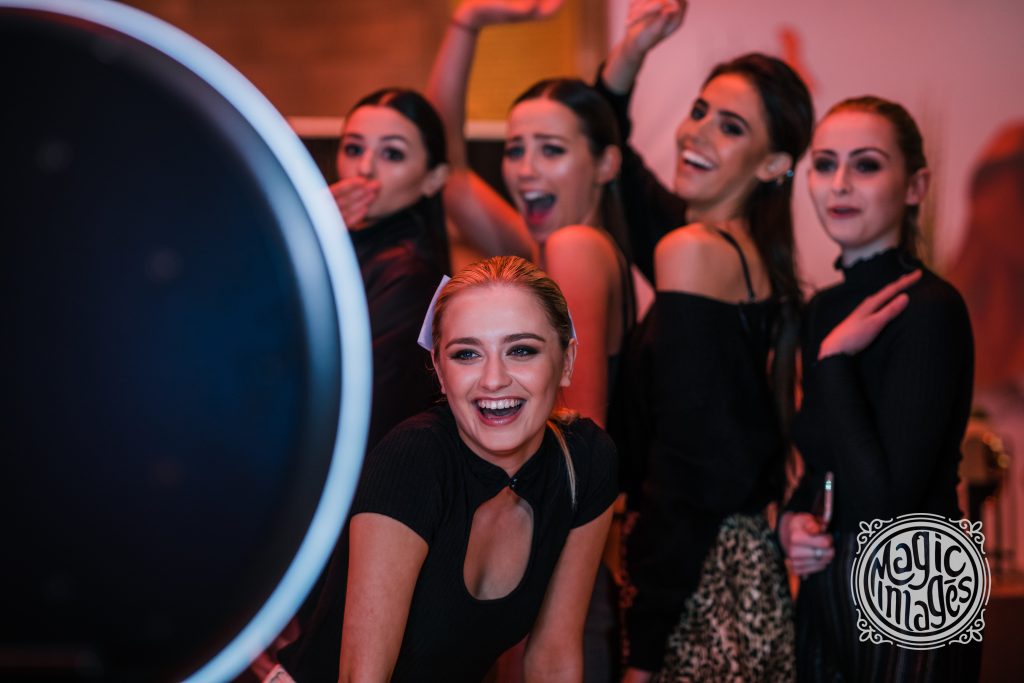 A group of girls taking a photo